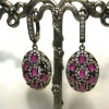Boucles d'oreilles avec zirconium en rubis