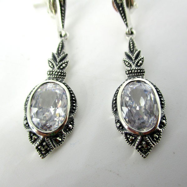 Boucle d'oreille vintage en argent et zirconium