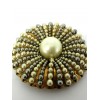 Broche en perles soleil